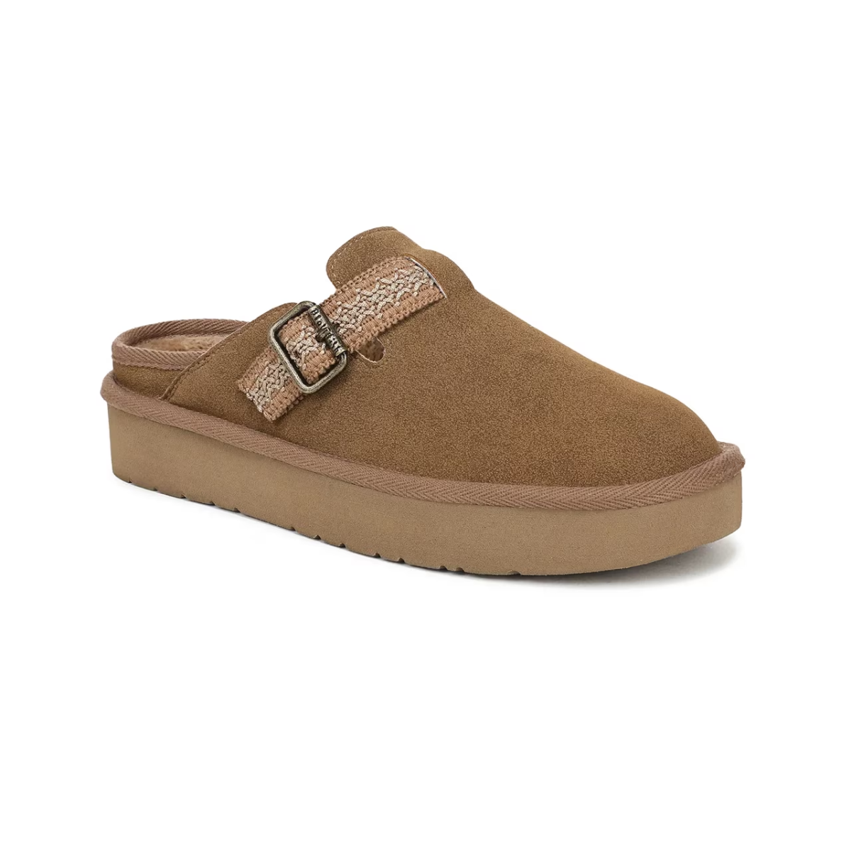 The Blowfish Malibu Monday Clog by CALERES INC is a brown tan faux suede slip-on with a tan buckle strap and thick rubber sole, pictured at a three-quarter angle on a white background. Main image