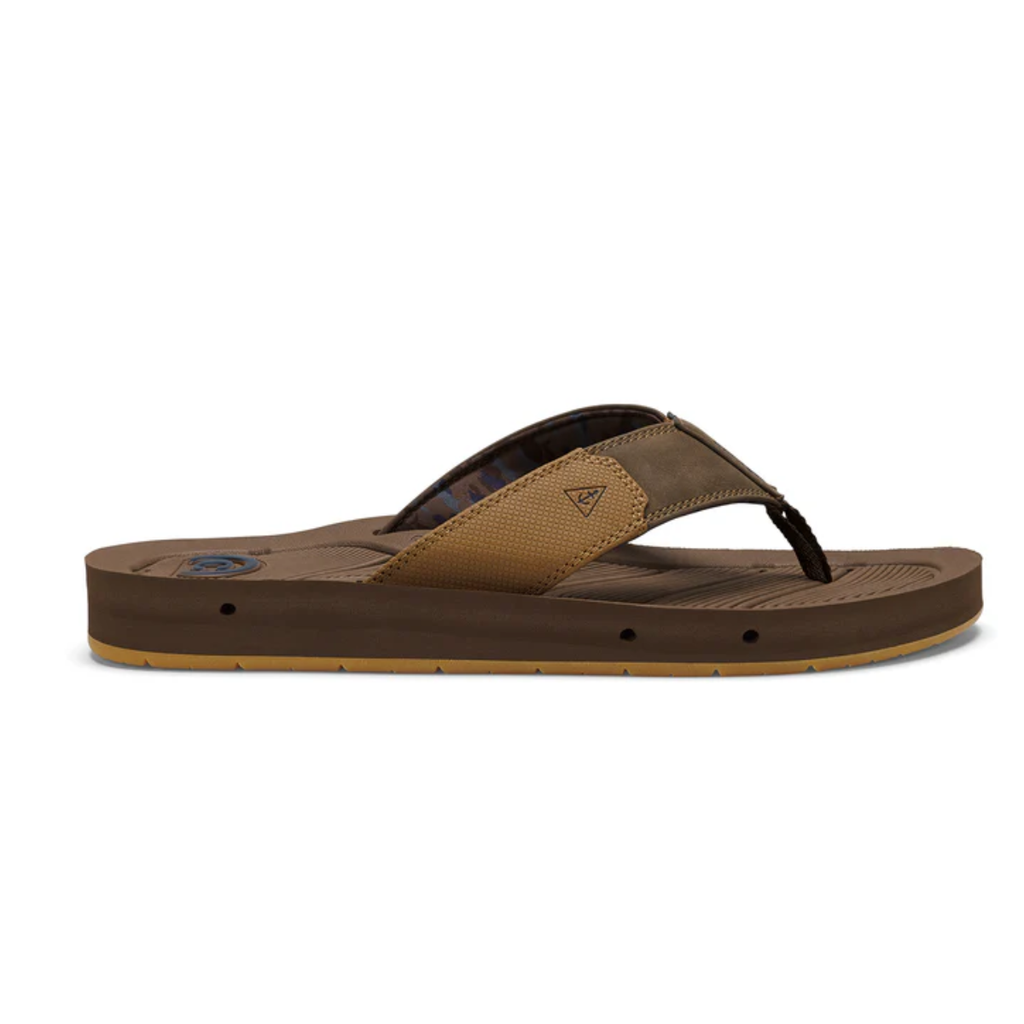 The COBIAN Men's Draino 2 Flip Flop in brown features a textured, non-slip footbed and a two-tone strap, shown in side profile against a white background.