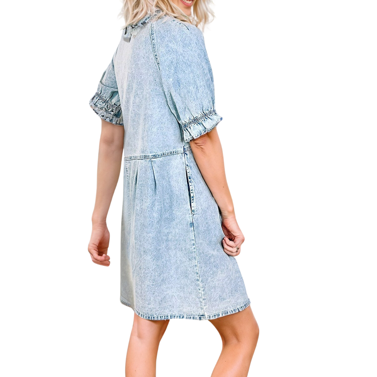 A person wearing a FASHION GO Ruffled Short Sleeve Buttoned Denim Dress, showcasing an elegant retro look. The individual is turned slightly to the side, with one hand in a dress pocket.