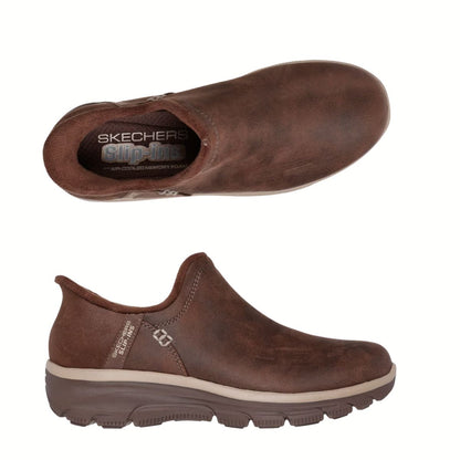 The Skechers Slip-ins Relaxed Fit: Easy Going - Modern Hour by SKECHERS USA INC are shown from top and side views, featuring all-day comfort with a cushioned sole and Air-Cooled Memory Foam insole.