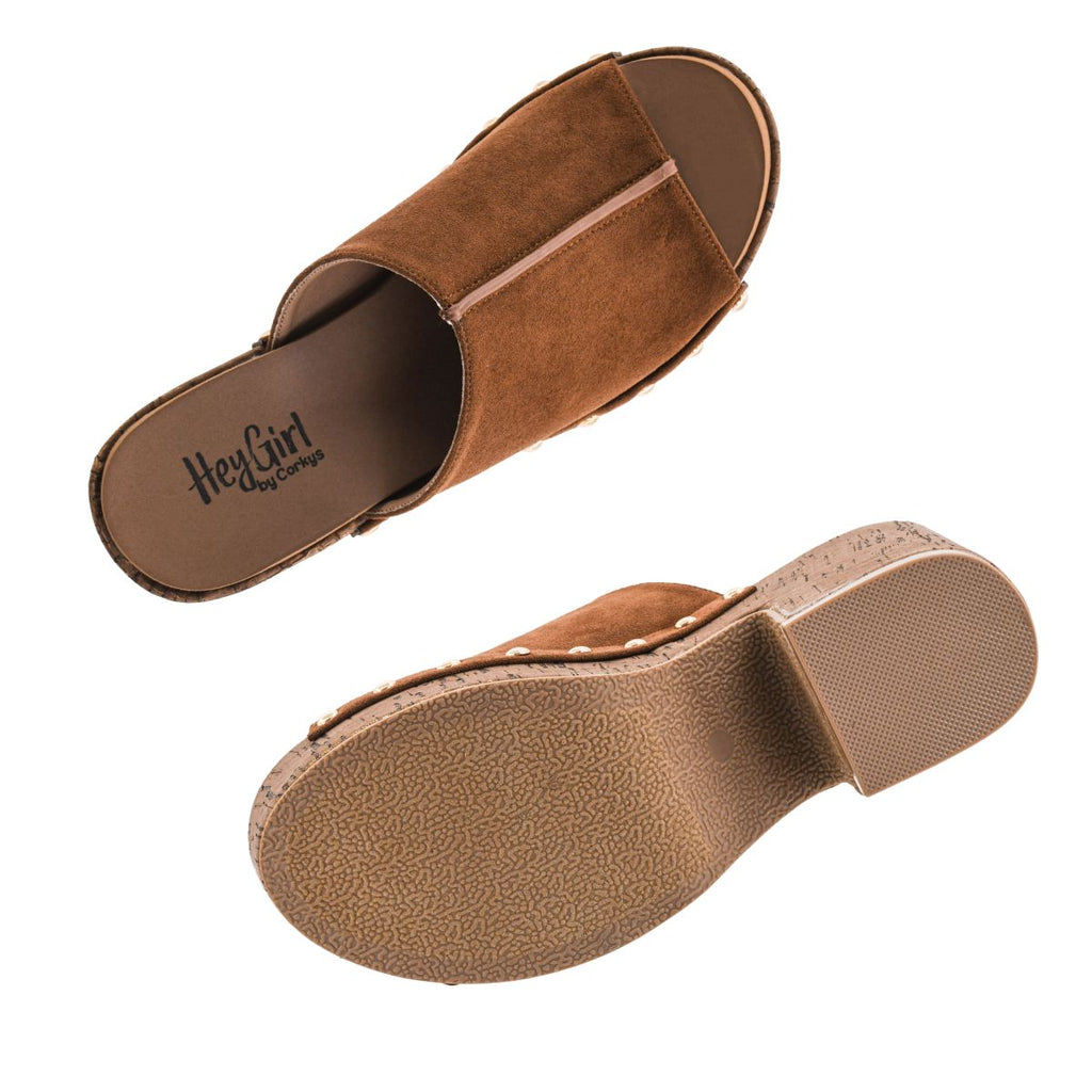 A pair of Gaslight Heel brown suede open toe mule sandals by CORKY’S FOOTWEAR INC is shown, with one sandal displaying the top and the other revealing the sole featuring a textured grip.