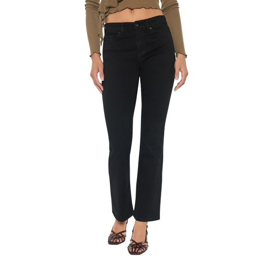 A person wearing FASHION GO High Rise Slim Bootcut Jeans in Black Wash and a brown long-sleeve crop top with patterned heels, standing against a white background.