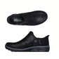Top and side views of the black SKECHERS USA INC Skechers Slip-ins Relaxed Fit: Easy Going - Modern Hour, showcasing a rounded toe and cushioned Air-Cooled Memory Foam sole for easy, comfortable slip-on wear.