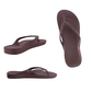 Three ARCHIES Flip Flop in Brown by ARCHIES FOOTWEAR LLC are pictured on a white background—two in side view and one from above—highlighting their arch support, simple thong style, and textured soles.