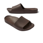 The Archies Slide Sandal in Brown by ARCHIES FOOTWEAR LLC features a single wide strap, textured footbed, and arch support, shown from side and three-quarter angles on a white background.