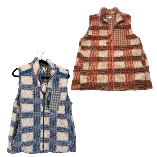 Two Umgee Fleece Zip Up Vests are shown side by side—one in blue and white, the other in orange and white—each featuring plaid pockets, ideal for effortless fall layering.