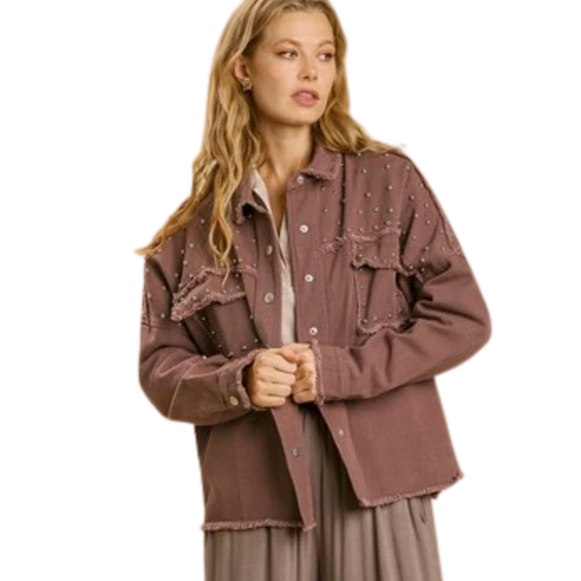 A woman wearing an Umgee Collared Jacket with Silver Studs over a taupe dress, standing against a white background.