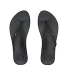 A pair of REEF Cushion Slim Flip Flops in Black, featuring thin straps and the REEF logo on a cushioned footbed, viewed from above on a white background—the perfect summer sandals for everyday wear.