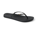 The REEF Cushion Slim Flip Flop in Black is displayed on a plain white background, featuring a simple thong strap design and cushioned footbed, making it an ideal choice for summer sandal enthusiasts seeking comfort.