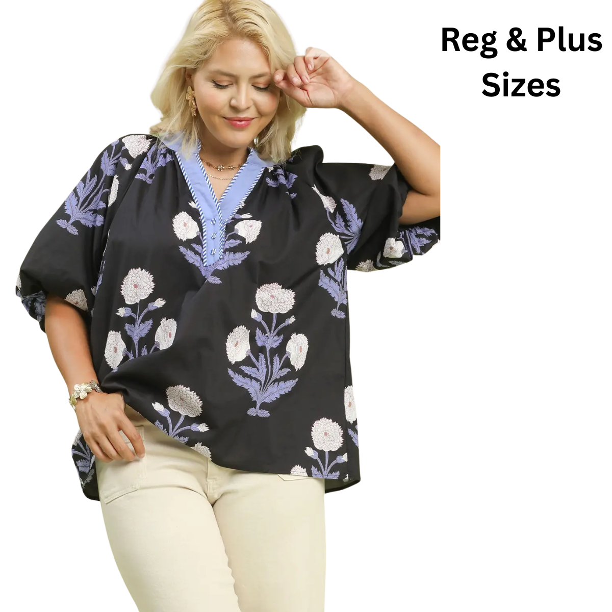 A woman models the Umgee Floral Print V-Neck Top with blue trim, paired with beige pants. Text reads "Reg & Plus Sizes. Main image