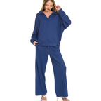 A woman wearing a dark blue FASHION GO Scuba Collared Pullover and Pants Set featuring a collared pullover and wide-leg trousers with a center seam.