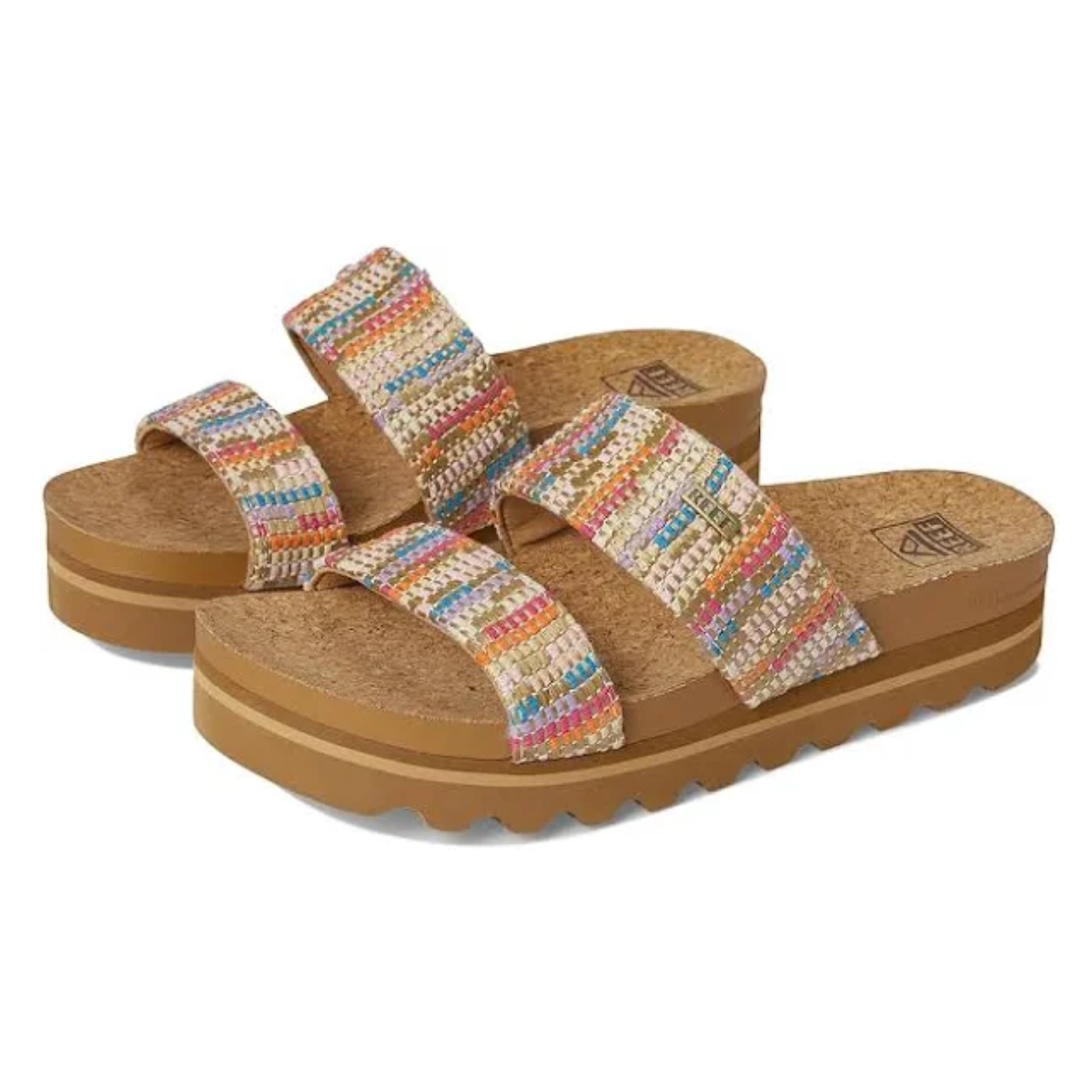 The REEF Cushion Vista Hi in Beachy Woven features a cork-cushioned footbed, tan soles, and two colorful woven straps across each foot. Main image