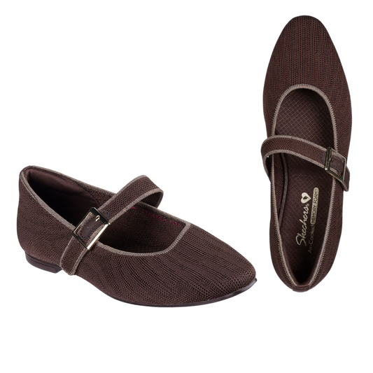 A pair of SKECHERS Cleo Snip Mary Jane Glamorous flats in Chocolate, with a textured stretch-knit, buckle strap, and rounded toe, shown from side and top views. Features Air-Cooled Memory Foam for all-day comfort.
