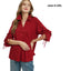A woman wears the Umgee Striped V-Neck Collared Blouse in Deep Red/Crimson with wide cuff sleeves and blue jeans; “sizes S-2XL” appears in the upper right corner.