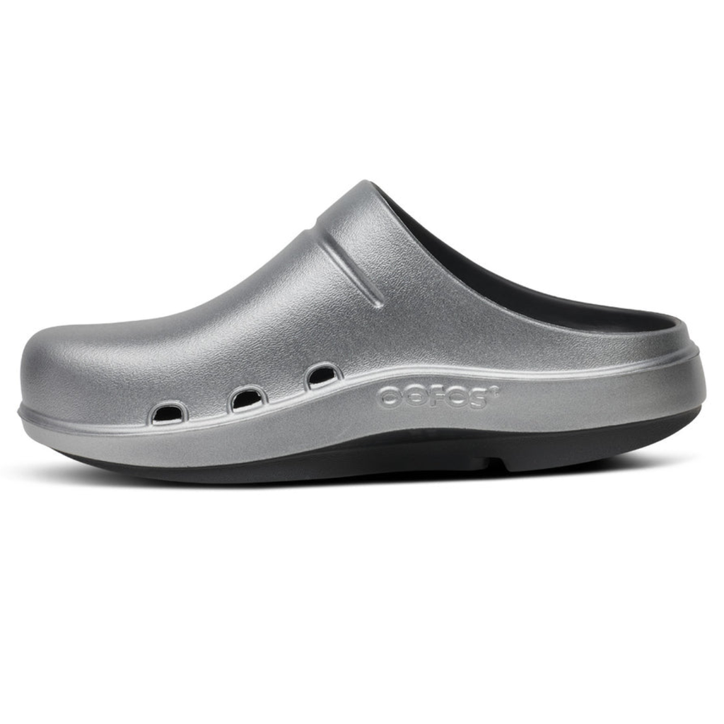 Metallic grey Women’s Clog Cloog Luxe by Oofos in Basalt recovery clog featuring a thick black sole.