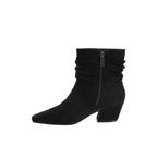 The Addicted Faux Suede Low Heel Slouch Ankle Boot by CORKY'S FOOTWEAR INC is a black ankle boot crafted from faux suede, featuring a pointed toe, low block heel, slouch shaft, and side zipper detail, displayed against a white background.