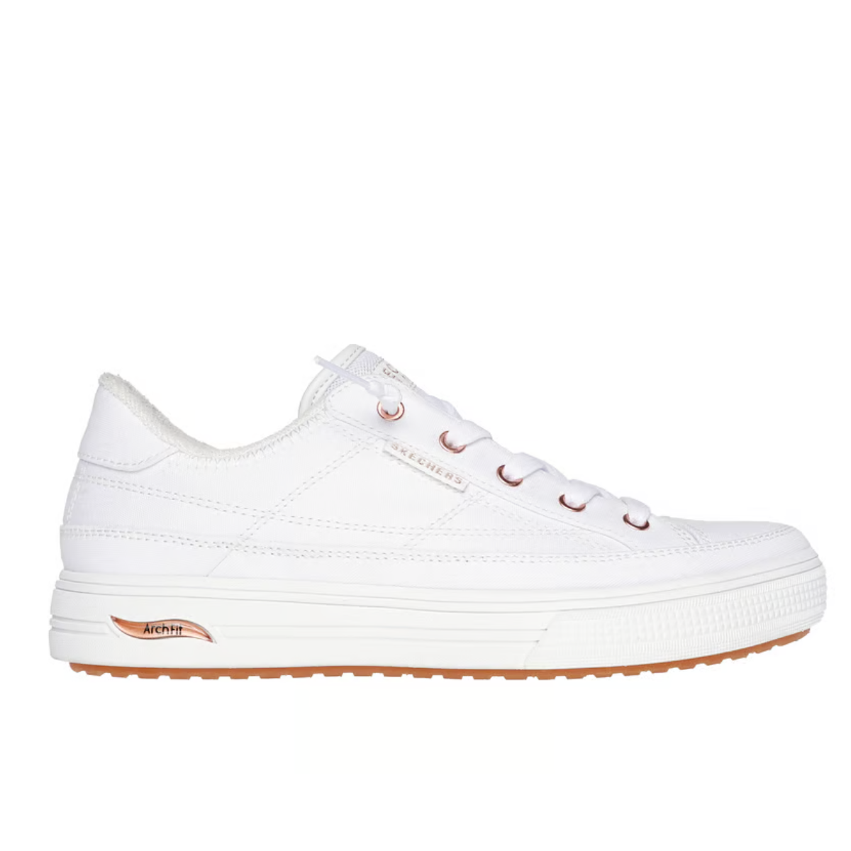 The Skechers Arch Fit Arcade White Sneaker - Meet Ya There by SKECHERS USA INC features a white canvas upper, white laces, thick sole, brown tread, and the Arch Fit logo on the midsole for enhanced arch support.