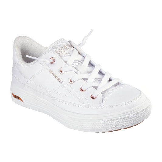 The Skechers Arch Fit Arcade White Sneaker - Meet Ya There by SKECHERS USA INC features a canvas upper, low-top design, white sole and laces, metallic eyelets, and provides excellent arch support. Shown on a plain white background.