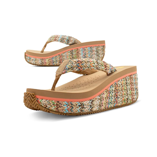The Island Wedge Rattan Flip Flop in Multi Natural by Volatile from PV Footwear features colorful woven raffia straps and platform wedge soles with a matching pattern.
