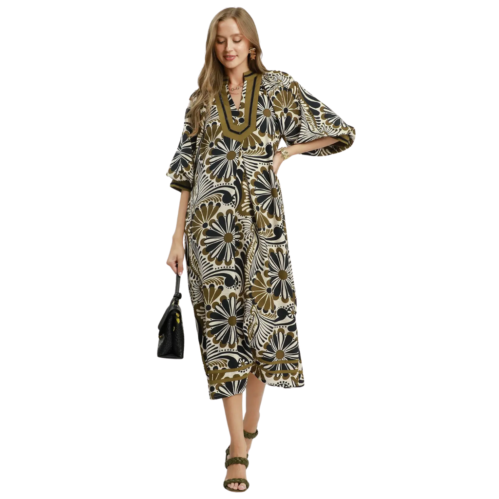 Abstract print midi dress with split V-neckline, contrast trim, short wide sleeves, and side pockets