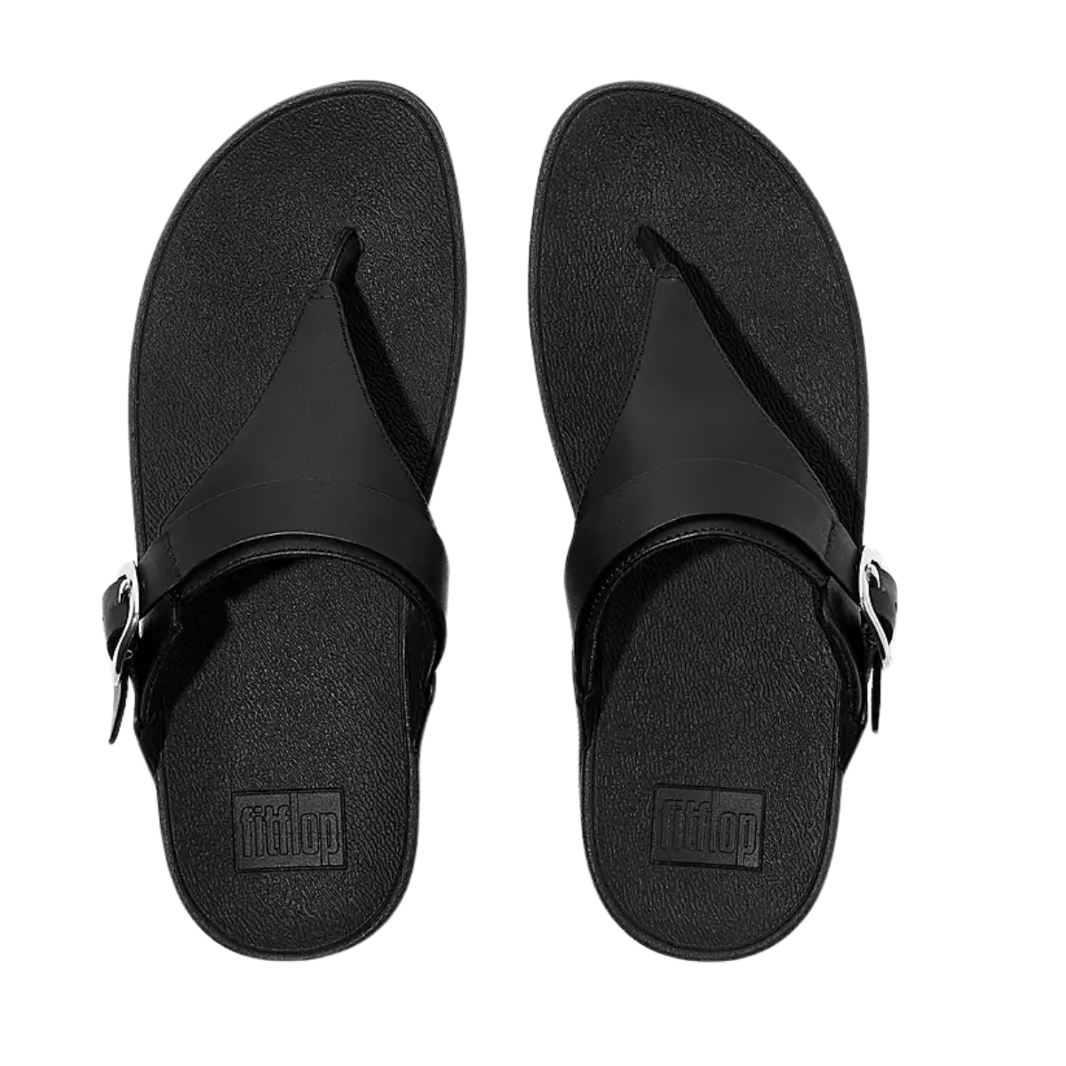 A pair of black Fit Flops LULU Adjustable Leather Toe-Posts, featuring textured soles, side buckles, and signature Microwobbleboard comfort midsole, shown from above on a white background. Main image