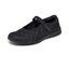 The SKECHERS Retro Lite - Cozy Fit Mellow Maryjane Sneaker is a black flat shoe with quilted stitching and a single velcro strap across the top, featuring Skechers Memory Foam for lightweight comfort, shown on a white background.