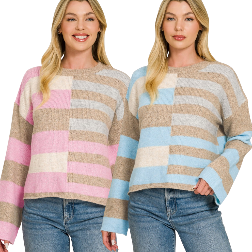 Two women stand side by side against a white background, both wearing the FASHION GO Lightweight Wool Blend Color Block Sweater in neutral, pink, and blue stripes—perfect for your fall wardrobe—and paired with classic blue jeans.