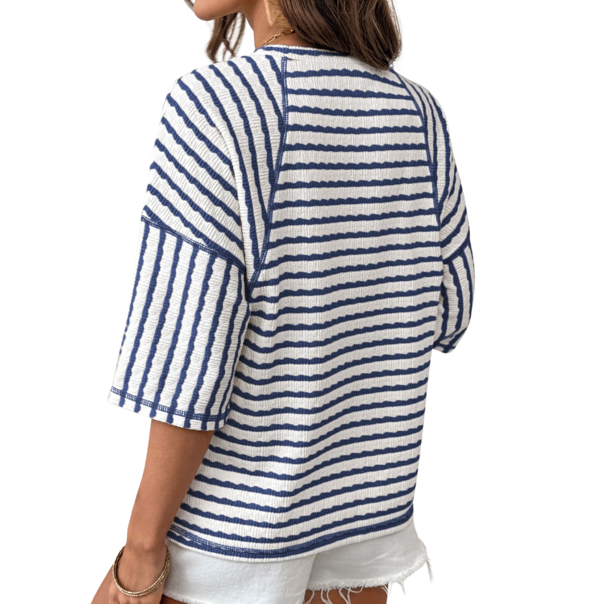 Women's stripe textured knit top with a round neckline, half sleeves, relaxed fit, and split hem