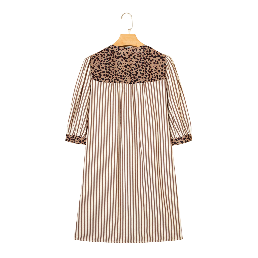 Women's striped shirt dress with leopard trim accents, button-front closure, bracelet sleeves, and a relaxed fit