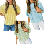 Three women wear FASHION GO Tie Half Sleeve Pleated Detail Babydoll Blouses in yellow, blue, and light green. Each blouse features pleated detailing with a gathered design at the chest and is made from lightweight, breathable fabric. The women’s faces are not visible.