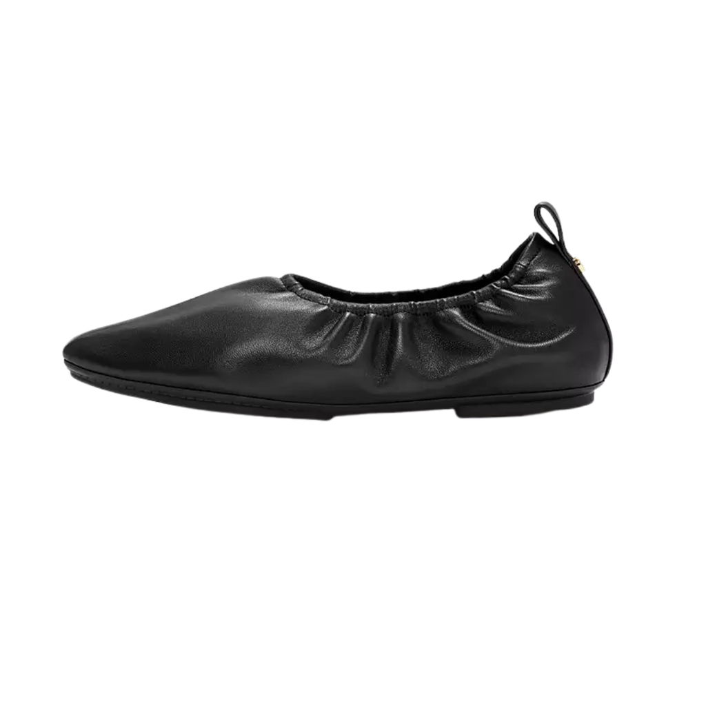 The DELICATO Poise Leather Ballerinas from fit flop feature a black ruched elastic upper, rounded toe, and small back pull tab—combining comfort and effortless style for easy all-day wear.