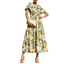 A person wearing the FASHION GO Smocked Top Woven Floral Tiered Midi Dress, holding a beige clutch, and paired with beige heeled sandals.