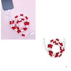 The Zenana Beaded DUAL USB FAST CHARGING CABLE in assorted colors is pictured connected to a phone and coiled on a white background, featuring alternating red and white beads.