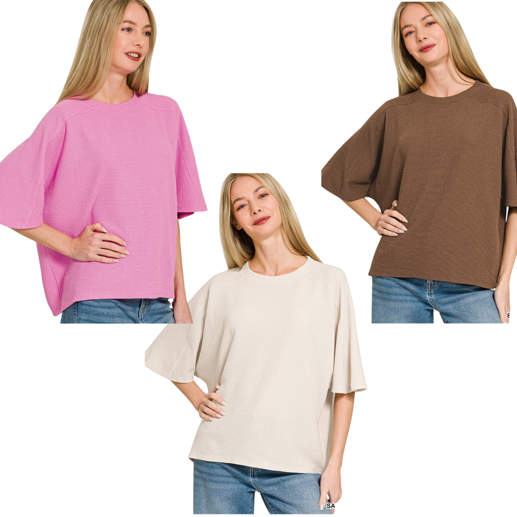 A woman models the Zenana Double Knit Short Sleeve Top—an everyday essential—in pink, cream, and brown, styled with blue jeans against a white background.