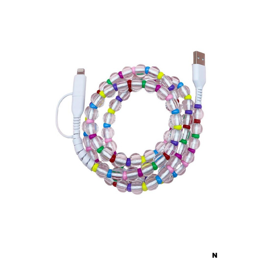 The Zenana Beaded DUAL USB FAST CHARGING CABLE features assorted colorful beads and a dual USB design, blending style with fast charging and broad device compatibility—shown coiled in a circle on a white background.