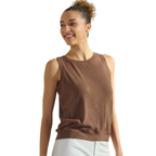 A woman wears the FASHION GO Women's Ribbed Viscose Crew Neck Tank in brown with light pants, standing and smiling against a white background.