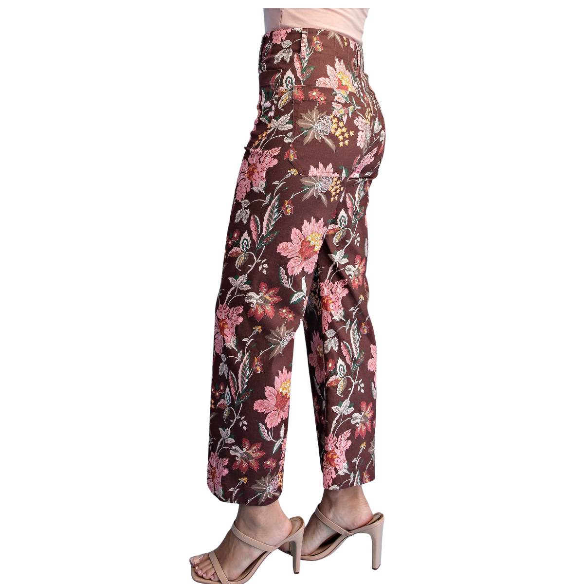 A person wears FASHION GO Pink and Brown Floral Ankle Cropped Pants, styled with beige heeled sandals.