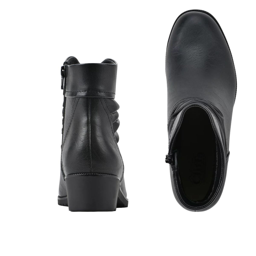 The White Mountain Durbon Ankle Bootie is displayed from the back and top views on a white background, highlighting its side zipper and low block heel for a comfortable bootie style.