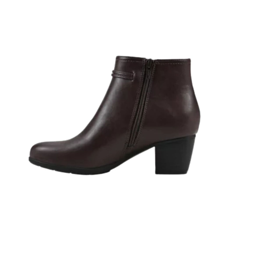 The Angelo Block Heel Ankle Bootie by cliffs is a dark brown leather ankle bootie featuring a side zipper and a low block heel, shown on a white background.