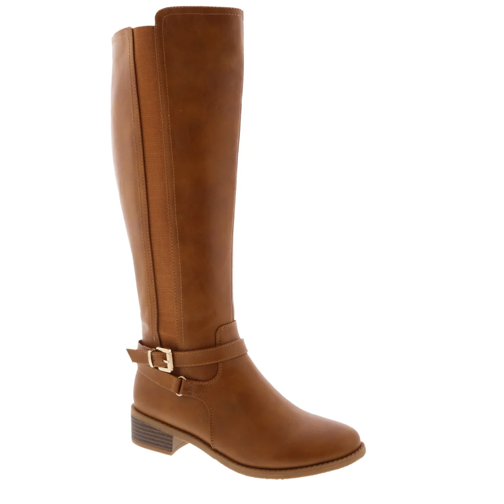 The Alana Tall Riding Boot by Top Guy features brown leather, a low stacked heel, side buckle strap, and rounded toe—classic style meets everyday comfort.