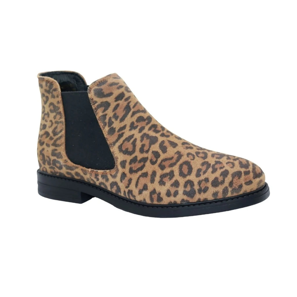 Introducing the Tiffany Chelsea Boot by Eric Michael—a standout tan Chelsea boot with a black sole and striking leopard print pattern, featuring signature black elastic side panels. This bold design effortlessly combines classic style and modern flair.