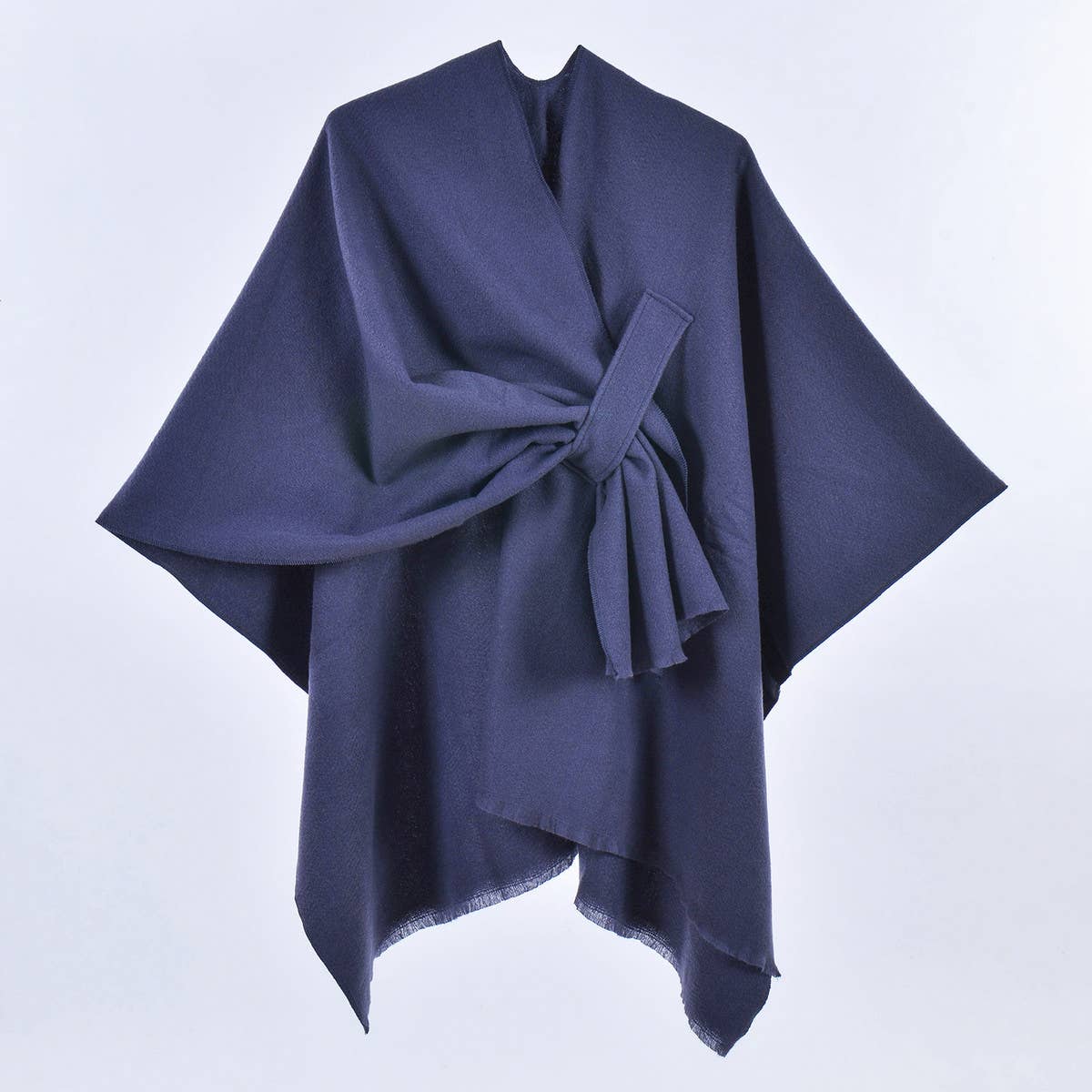 The ACCITY SIMPLE SOLID COLOR OBLIQUE STRAP CAPE SHAWL features a navy blue, asymmetrical design with wide sleeves and a side-tied belt, making it a stylish layering piece, shown on a plain white background.