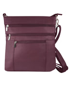 The Roma Leathers, Inc. cowhide leather crossbody in burgundy features three zippered pockets and an adjustable shoulder strap, shown against a white background.