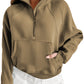 A person is wearing a Shewin Gray Zip-Up Stand Collar Ribbed Thumbhole Sleeve Sweatshirt, paired with white shorts.