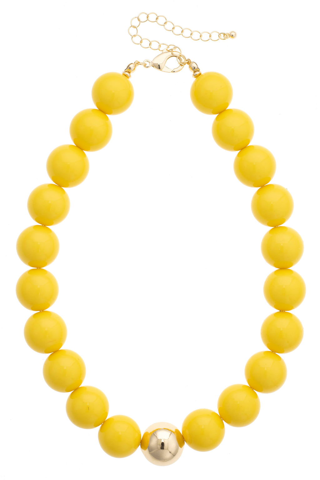 The Marjorie Game Day Beaded Necklace by Canvas Style is a bold statement piece featuring large, round yellow oversized beads and a single metallic gold bead at the center. It is finished with an adjustable gold chain clasp, making it perfect for adding a pop of color to any outfit.