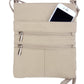 The Roma Leathers, Inc. Large cowhide leather crossbody shoulder bag in beige features two zippered pockets, with a smartphone partially visible in the top pocket.