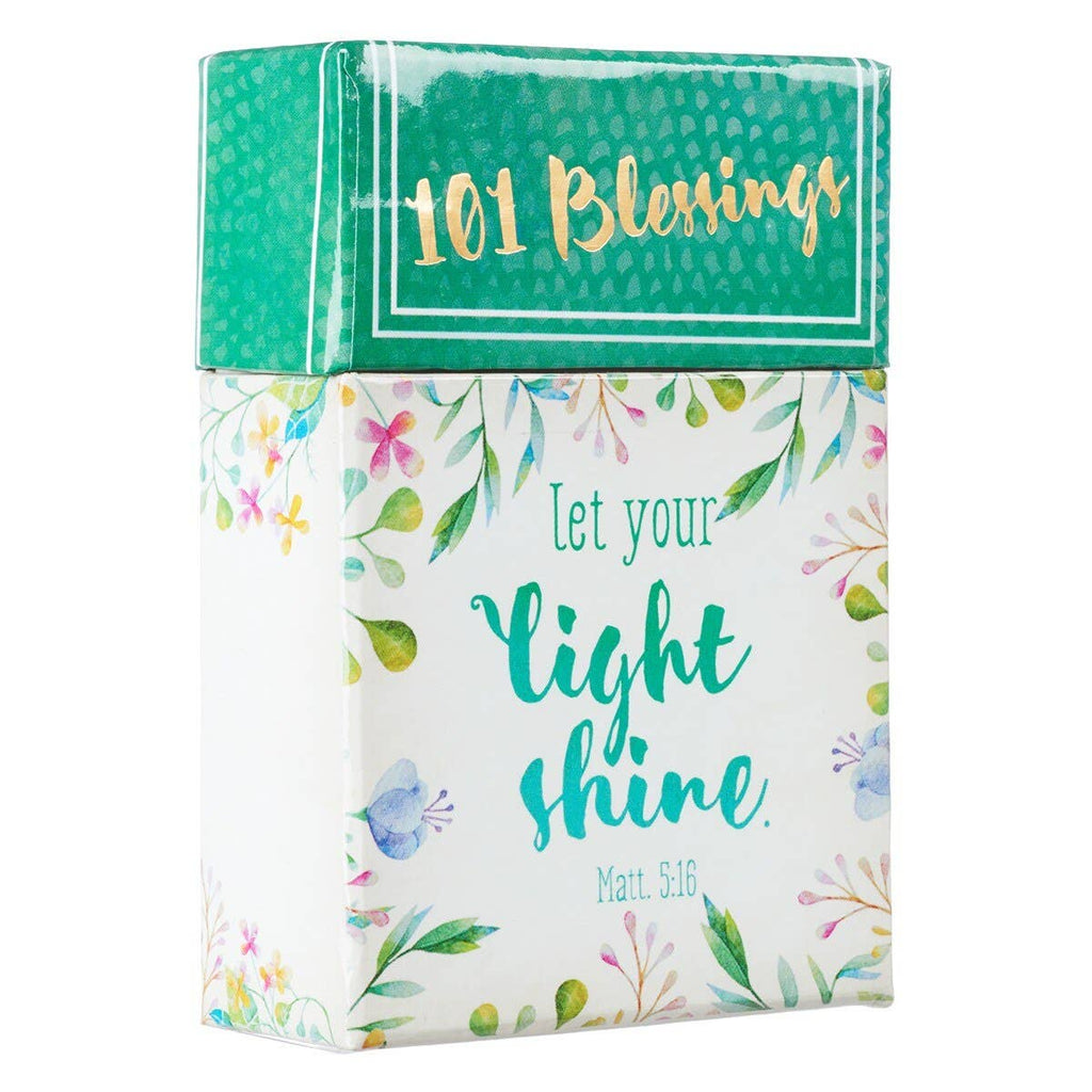 A decorative "Box of Blessings Let Your Light Shine" by Christian Art Gifts, adorned with floral designs and the words "Let your light shine. Matt. 5:16" on the front, filled with inspirational cards featuring encouraging Bible verses.