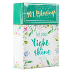 A decorative "Box of Blessings Let Your Light Shine" by Christian Art Gifts, adorned with floral designs and the words "Let your light shine. Matt. 5:16" on the front, filled with inspirational cards featuring encouraging Bible verses.