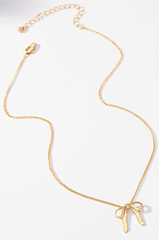 A gold Small Bow Pendant Necklace by FASHION GO on a white background.