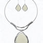 The Abstract Elegance Choker Set by FASHION GO features a silver abstract necklace and matching drop earrings, each adorned with a large cream-colored stone framed by irregular silver outlines.